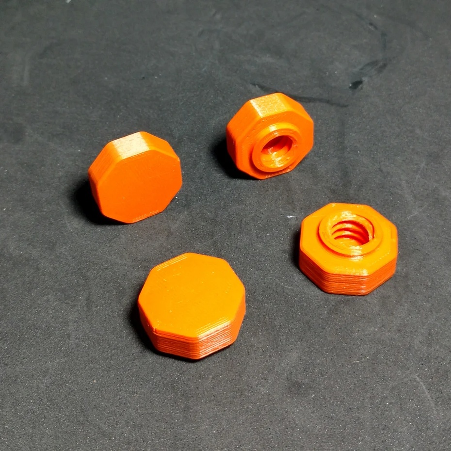 Porca. Impressa totalmente em 3D, é utilizada para montagem da estrutura. Ao todo 4 são usadas para a montagem proposta na próxima etapa.