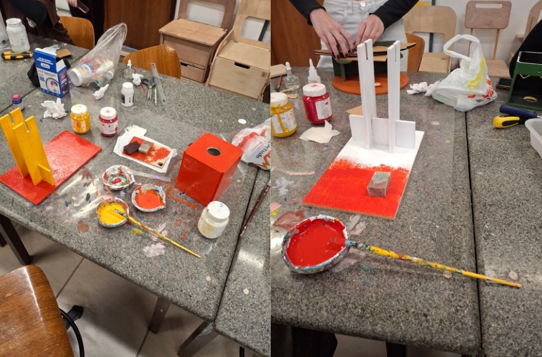 Depois de deixar o fundo preparador secar completamente eu iniciei a pintura, utilizando tinta esmalte. Escolhendo vermelho e amarelo, de inicio as cores da base e cabeça eram para ser tons distintos de laranja enquanto as paredes de suporte seriam amarelo, mas ao secar elas ficaram praticamente iguais infelizmente.

As cores vem da escola Bauhaus, da qual serviu como grande inspiração para esse projeto, esse é o motivo de eu ter utilizado essas cores especificas e uma so cor primaria por parte do produto.