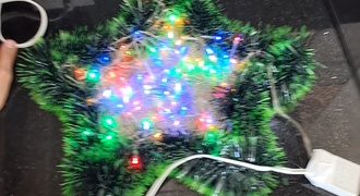 Estrela natalina de palitos de churrasco