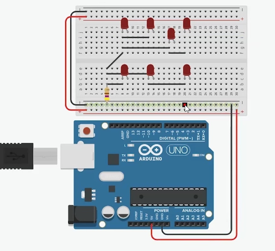 Vamos ligar todos os terminais (pernas) negativos do led. Lembre-se que o terminal “reto” é o negativo (catódica) e o terminal curvado é o positivo (Anodo). Você pode deixar o mouse sobre a ponta do terminal para ver seu nome.